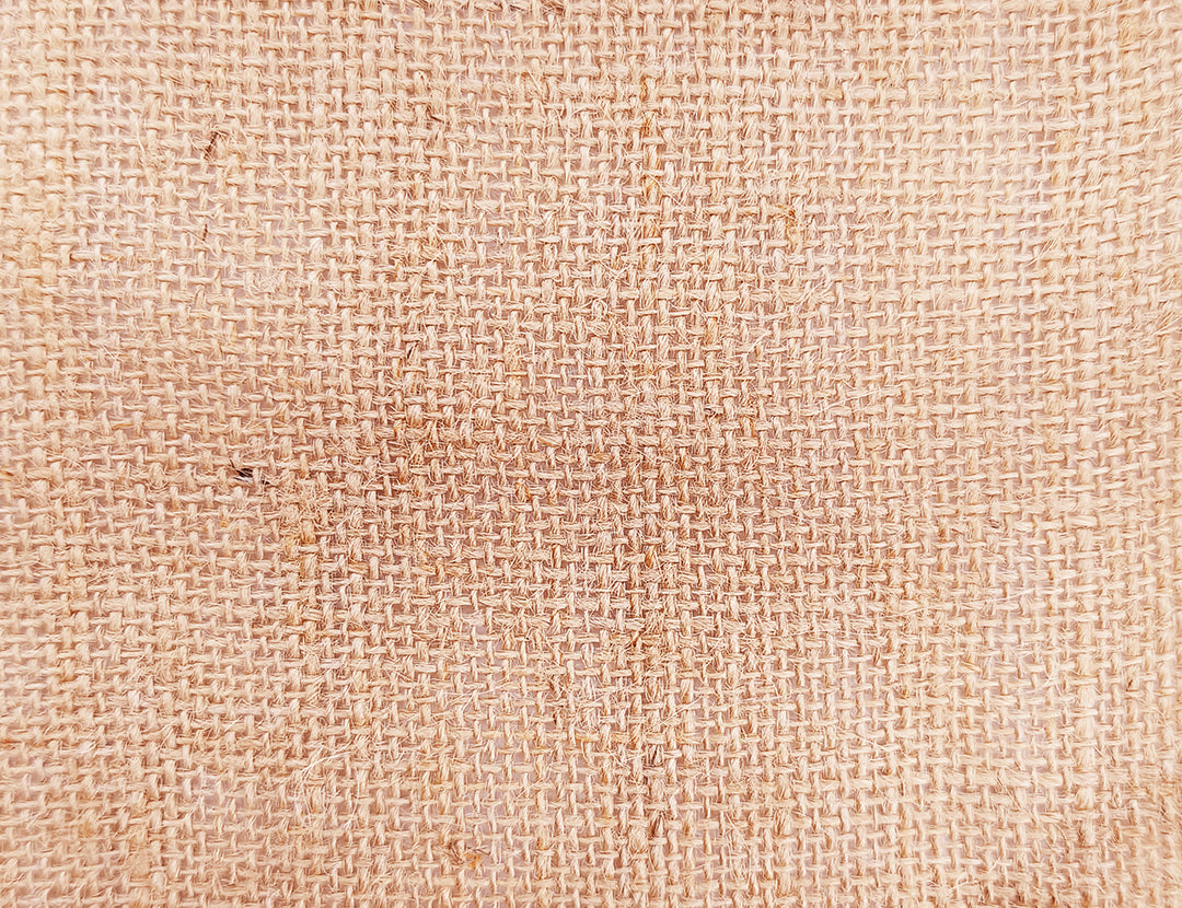 A fabric swatch of natural colored jute fabric